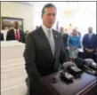  ?? STEVE HELBER — AP ?? Former US Senator Rick Santorum stands next to a stack of letters and emails from people opposed to Medicaid Expansion during a press conference at the Capitol in Richmond, Va., Wednesday.