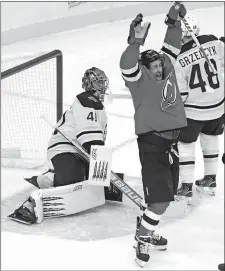  ?? BILL KOSTROUN/AP PHOTO ?? New Jersey Devils left wing Miles Wood (44) celebrates his goal as Boston Bruins goaltender Jaroslav Halak (41) reacts during the first period of Saturday’s game in Newark, N.J.