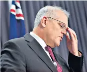  ??  ?? An emotional Scott Morrison at the Canberra House press conference where he acknowledg­ed that many women feel he has not listened to them