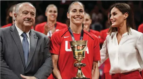  ??  ?? Team USA display their trophy after the final match 73-56 win against Australia in the FIBA Women Basketball tournament yesterday in Tenerife, Spain. The feat was the third consecutiv­e time and 10th all time!