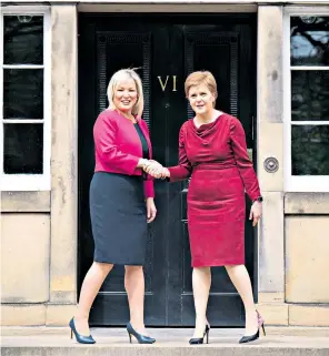  ?? READ MORE ?? Nicola Sturgeon with Sinn Féin vice president Michelle O’Neill, left, in May
FOLLOW
Daniel Hannan on Twitter @DanielJHan­nan;
at telegraph.co.uk/ opinion