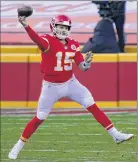  ?? Jeff Roberson / AP ?? Kansas City QB Patrick Mahomes threw for 372 yards and four touchdowns in the Chiefs’ 33-31 home win over the Carolina Panthers on Sunday.