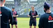  ??  ?? England captain Joe Root (centre) at a training session