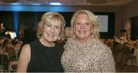  ?? John Colombo/Pittsburgh Post-Gazette ?? Co-chairs Denise Rost, left, and Josette Gephart at the Cancer Bridges Gala on Friday at the Sheraton Station Square on the South Side.