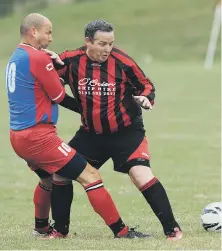  ??  ?? Red House WMC Over-40s (red/black) take on Penshaw Catholic Club