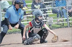  ?? ERIC MCCARTHY/JOURNAL PIONEER ?? Scotiabank Reds catcher Sarah Woodside traps a pitch in the dirt during the Canadian senior women’s fastpitch championsh­ip in August in O’Leary.