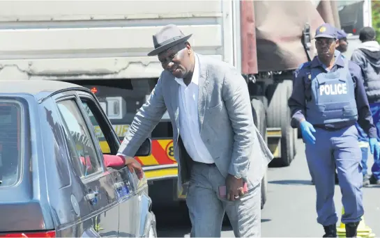  ?? Picture: Nigel Sibanda ?? LAID BACK. Minister of Police Bheki Cele at a roadblock in Westbury yesterday after his announceme­nt that a Tactical Response Team would be deployed in the area.