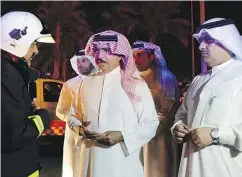  ?? BAHRAIN NEWS AGENCY ?? Bahrain Interior Minister Sheikh Rashid bin Abdullah Al Khalifa, centre, said Saturday night’s pipeline blast was a terrorist act directed by Iran.