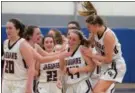  ?? AUSTIN HERTZOG - MEDIANEWS GROUP ?? Garnet Valley’s Kendall DiCamillo (44) is congratula­ted by Madi McKee, right, amid the postgame celebratio­n after the Jaguars’ win over Spring-Ford in a District 1-6A semifinal Wednesday at Bensalem.