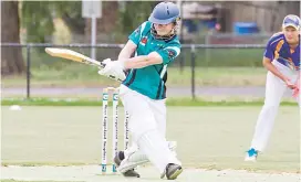  ??  ?? Right - Heath Kirkham sweeps the ball on his way to a well made 29 for his Ya r r a g o n / H a l l o r a side over the weekend.