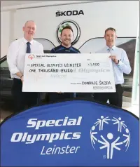  ??  ?? PICTURED RIGHT: Aidan O’Leary and Austin Codd of Skoda Sales presenting Eoin Treanor (centre), fundraisin­g co-ordinator with Special Olympics Leinster with a cheque for €1,000 at Donohoe Skoda in Enniscorth­y.