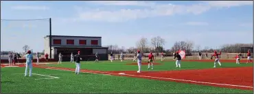  ?? ?? At their facility at the high school March 13, members of the Shelby Whippets baseball team prepare for their season.