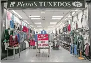  ?? DAVE ZAJAC/RECORD-JOURNAL VIA AP ?? This Thursday, Oct. 3 photo shows Pietro’s Tuxedos in the Westfield Meriden mall in Meriden. Owner Joe Zaccariell­o will be closing his shop after 30 years at the mall.