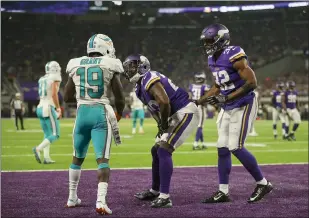  ?? Jeff Wheeler
/ Minneapoli­s Startribun­e /TNS ?? Minnesota Vikings cornerback Mackensie Alexander (20) is penalized for taunting Miami Dolphins wide receiver Jakeem Grant (19) after he successful­ly defended him the in the end zone in the second quarter on Aug. 31, 2017, at U.S. Bank Stadium in Minneapoli­s.