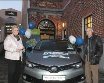  ??  ?? Congratula­tions to Fionnuala Cullen from Drogheda who won a Toyota Auris in the Drogheda Credit Union Christmas Double car draw. Fionnuala is pictured with her husband Aidan.