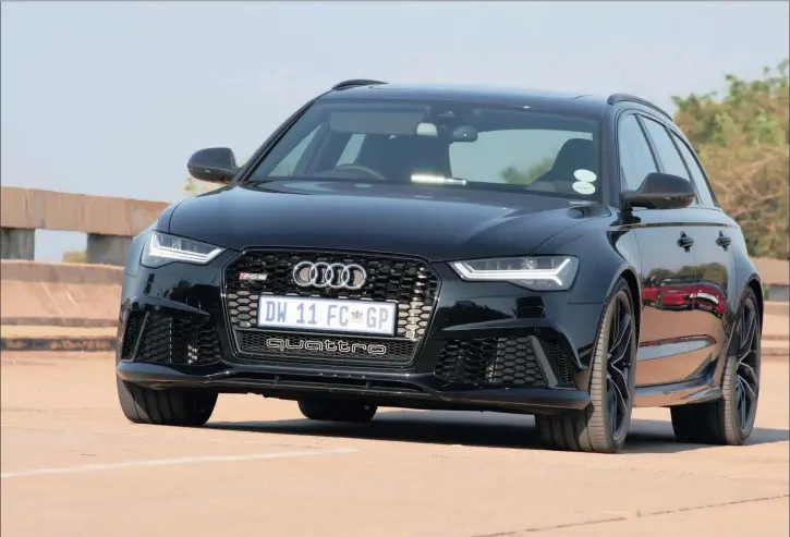  ??  ?? Looking very sinister in black, Audi’s RS6 wagon attracts huge attention. Turbo 4-litre V8 punches out 700Nm torque.