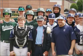  ?? EVAN WHEATON - MEDIANEWS GROUP ?? Bobby Shantz, center, is joined by Methacton and Pottstown’s baseball teams in the infield prior to a PAC crossover game on “Bobby Shantz Day” at Pottstown High School on May 3.