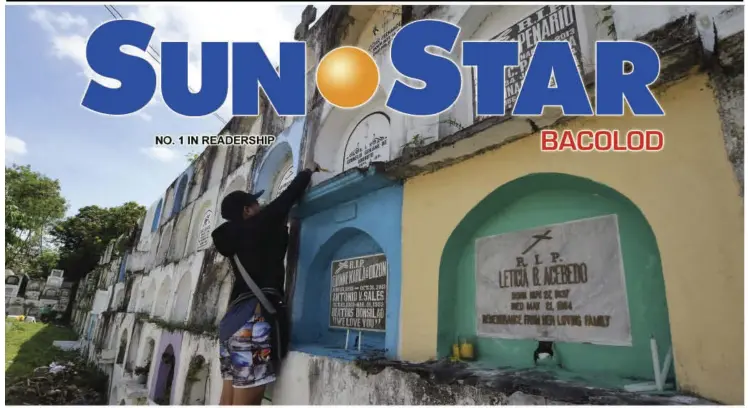  ?? MERLINDA PEDROSA ?? A MAN cleans the tombs at the Burgos public cemetery in Bacolod City in preparatio­n for the annual celebratio­n of All Saint’s Day and All Souls’ Day.