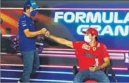  ?? FOTO: AP ?? Alonso y Sainz, en la rueda de prensa del GP de España de F1