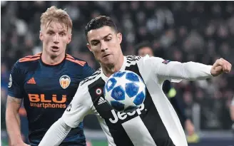  ?? MARCO BERTORELLO / AFP ?? Favorito. Cristiano Ronaldo comanda o ataque da Juventus no jogo contra a Fiorentina