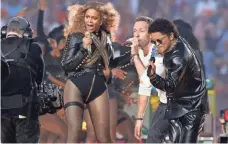  ?? MATTHEW EMMONS, USA TODAY SPORTS ?? The power of three: Beyoncé, Martin and Mars give the fans what they want Sunday night at Levi’s Stadium.