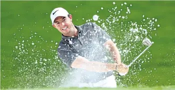  ?? WARREN LITTLE/GETTY IMAGES ?? Rory McIlroy plays a shot out of the bunker Friday during the second round of the 2017 PGA Championsh­ip at Quail Hollow Club in Charlotte, N.C.