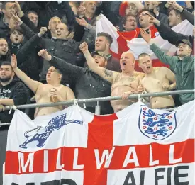  ??  ?? England supporters cheer during the Germany v England friendly in Dortmund.