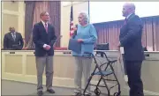  ?? Diane Wagner / RN-T ?? The Rome City Commission honors outgoing Commission­er Sue Lee during the last meeting of the year Monday with a proclamati­on and painting of the view from the top of Myrtle Hill. Pictured from left are Commission­er Bill Collins, Mayor Jamie Doss, Lee...