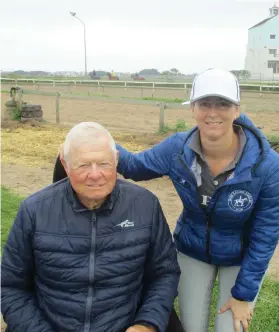  ??  ?? FAMILY TIME. Mike Bass with his daughter Candice, who has successful­ly settled into the task of running the family stables.