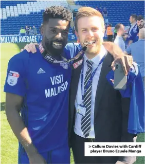  ??  ?? &gt; Callum Davies with Cardiff player Bruno Ecuele Manga