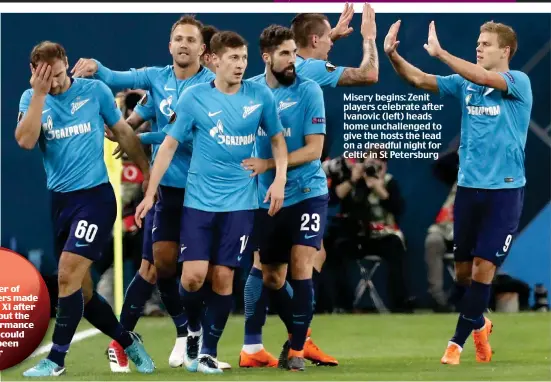  ??  ?? Misery begins: Zenit players celebrate after Ivanovic (left) heads home unchalleng­ed to give the hosts the lead on a dreadful night for Celtic in St Petersburg