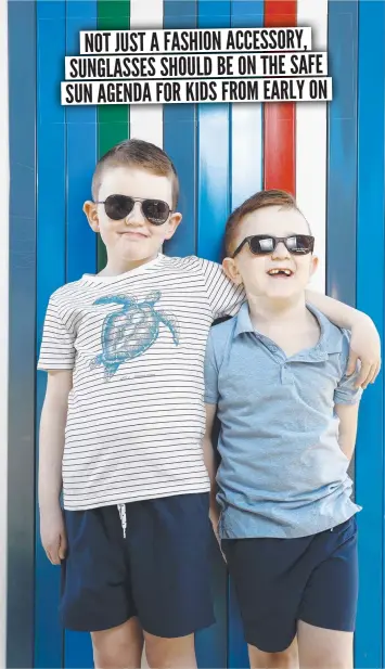  ?? Pic ture: Jonathan Ng ?? William Hawkins, 6, and brother Adam, 8, with their sunglasses, are learning about shielding their eyes from glare.