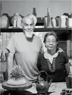  ??  ?? This page: Tessy’s tea set by Pettyjohn Pottery Opposite page, from top: Jon’s tea pot by Pettyjohn Pottery; Husband-and-wife duo Jon and Tessy Pettyjohn in their studio in Calamba