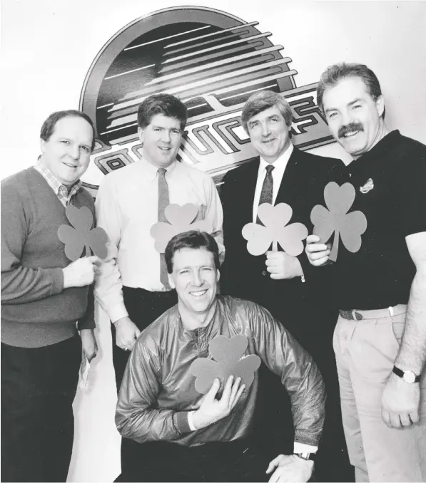  ?? RALPH BOWER/FILES ?? Irish eyes were smiling on St. Patrick's Day in 1989 when Canucks staff gathered to celebrate. They include, clockwise from bottom, Mike Murphy, Bob McCammon, Brian Burke, president and GM Pat Quinn and Jack McIlhargey.