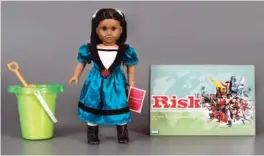  ?? STRONG NATIONAL MUSEUM OF PLAY/VICTORIA GRAY VIA AP ?? These three toys are being inducted this year into the National Toy Hall of Fame. They are, from left: sand, The American Girl Doll, and the game of Risk.