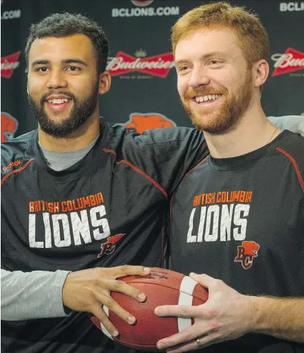  ?? RIC ERNST/FILES ?? No. 1 Lions quarterbac­k Jonathon Jennings, left, and former No. 1 starter Travis Lulay, work well together and put the team first.