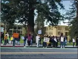  ?? COURTESY ?? About 100 people turned out for a Feb. 26 rally at Los Gatos High School protesting the Los Gatos-saratoga Union High School District’s plan to return students for just one hour of classroom instructio­n a week. The rally was organized by the Coalition for Los Gatos-saratoga Safe and Sane Return to In-person Schools.