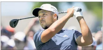  ?? USA TODAY Sports ?? CALLED IT: Xander Schauffele, teeing off on the first on Saturday, said Friday that course conditions would allow golfers to hunt down the leader over the weekend. Schauffele’s five-shot lead on Friday is down to one as Patrick Cantlay shot a 63 to get to 16-under.