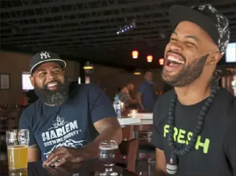  ?? Jessie Wardarski/ Post- Gazette ?? Black Brew Culture founder Mike Potter, left, and comedian and “Drinking Partners” podcast co- host Day Bracey co- organized the first Fresh Fest black beer festival last year. This year’s will be held Aug. 10 at Nova Place on the North Side.