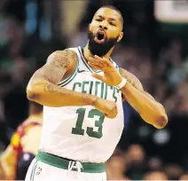  ?? MADDIE MEYER/GETTY IMAGES ?? Boston’s Marcus Morris celebrates after hitting a basket against the visiting Cavaliers during the first quarter on Sunday at TD Garden. The Celtics scorched the Cavs 108-83.