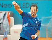  ?? ?? Triumphant: Andy Murray punches the air in celebratio­n after securing his first ever win against Canadian world No 16 Denis Shapovalov in the second round of the Madrid Open yesterday