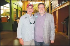  ?? NWA Democrat-Gazette/CARIN SCHOPPMEYE­R ?? Eric Scott and Sam Dean, Scott Family Amazeum executive director, visit at Adult Night.