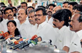  ??  ?? MIKE ON? Pro-Sasikala MLAs meet the media