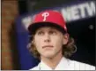  ?? FRANK FRANKLIN II — THE AP ?? Wichita State third baseman Alec Bohm reacts after being selected No. 3 by the Philadelph­ia Phillies during the first round of the MLB Draft Monday in Secaucus, N.J.