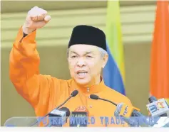  ??  ?? Ahmad Zahid addressing the delegates during the opening of the conference. — Bernama photo