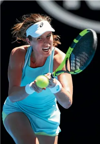  ?? PHOTOS: GETTY IMAGES ?? Johanna Konta, of Britain, plays a backhand in her first round match against Madison Brengle, of the United States, at the Australian Open in Melbourne yesterday.