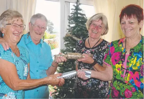  ?? PICTURE: ISLE OF MAN NEWSPAPERS ?? ALL SMILES: Cairns Post employee Nikki Knight (right) celebratin­g her first “Christmas” with her sisters since 1962 on the Isle of Man with (from left) Pam Fee from Isle of Man, Val Alliez of London and Pat Johnson of Brisbane.