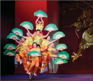  ?? (Special to the Democrat-Gazette/Tom Meinhold Photograph­y) ?? The Peking Acrobats perform Tuesday at Fayettevil­le’s Walton Arts Center.