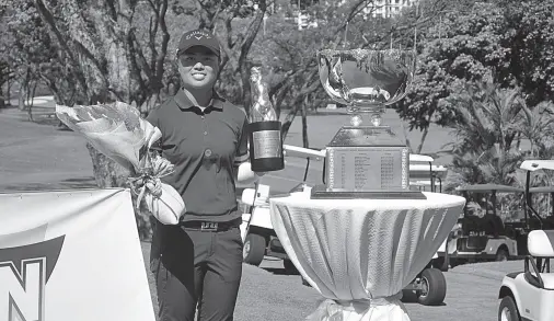  ??  ?? YUKA SASO holds the Champion Philippine Ladies Amateur Open trophy after completing a back-to-back title romp in the country’s premier championsh­ip.