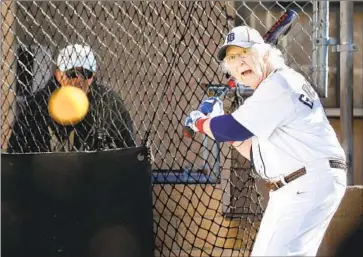  ?? Christina House Los Angeles Times ?? BENNY WASSERMAN, an octogenari­an with cancer, keeps his eyes on the ball at Home Run Park in Anaheim. We are approachin­g a time in which more people in the world will be 65 and older than 18 and under.